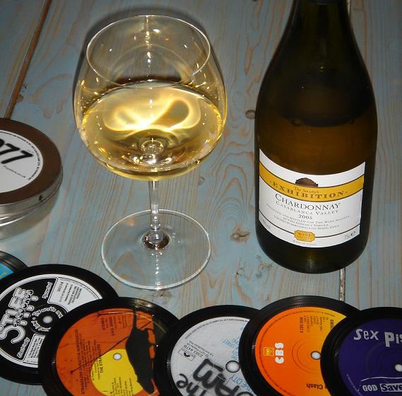 Chilean Chardonnayâ€¦..with my novelty collection of punk memorabilia coasters (for some reason).