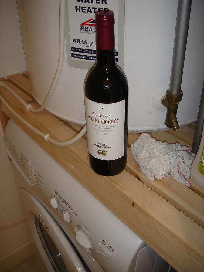 Shaken not stirred.  Society Medoc 2003, atop a washing machineâ€¦.for some reason.