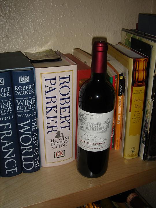 Château Reignac de Tizac, next to a book or two by Robert Parker (for some reason)