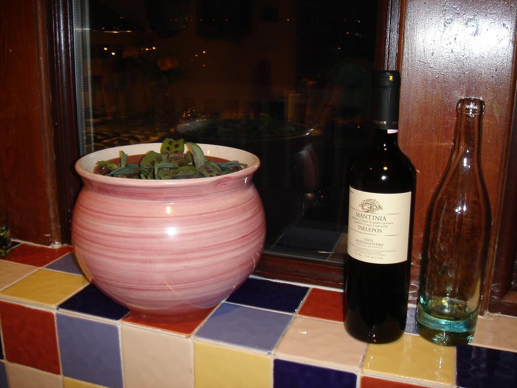 Mantinia (75cl) next to a Pot Lyonnais (46cl) and a plantâ€¦for some reason